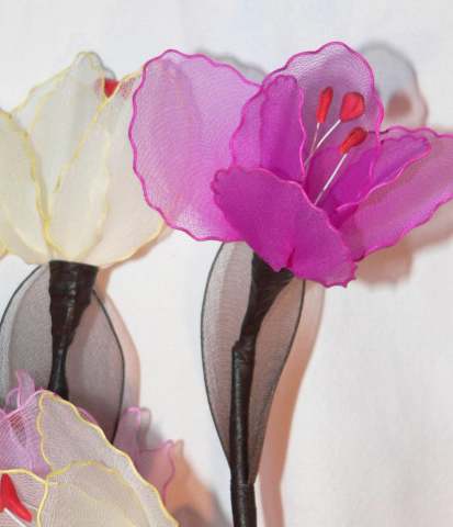 Pink and White Lillies on stems - fairy lights